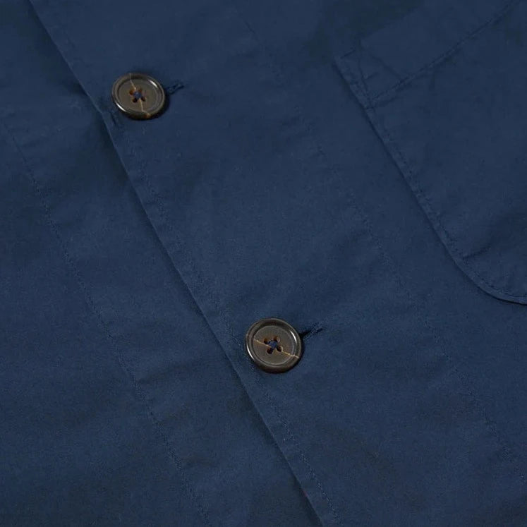 universal works Bakers Overshirt In Navy Poplin Button Detail Image