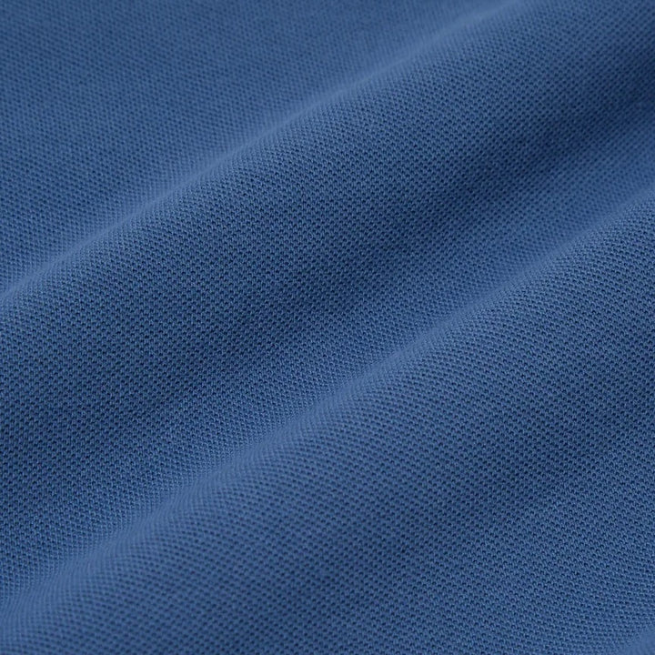 Universal Works Pique Cotton Vacation Polo Blue Fabric Detail Image